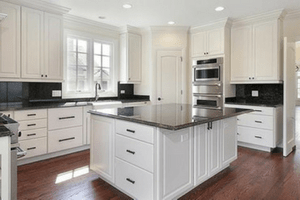 Beige countertops white cabinets