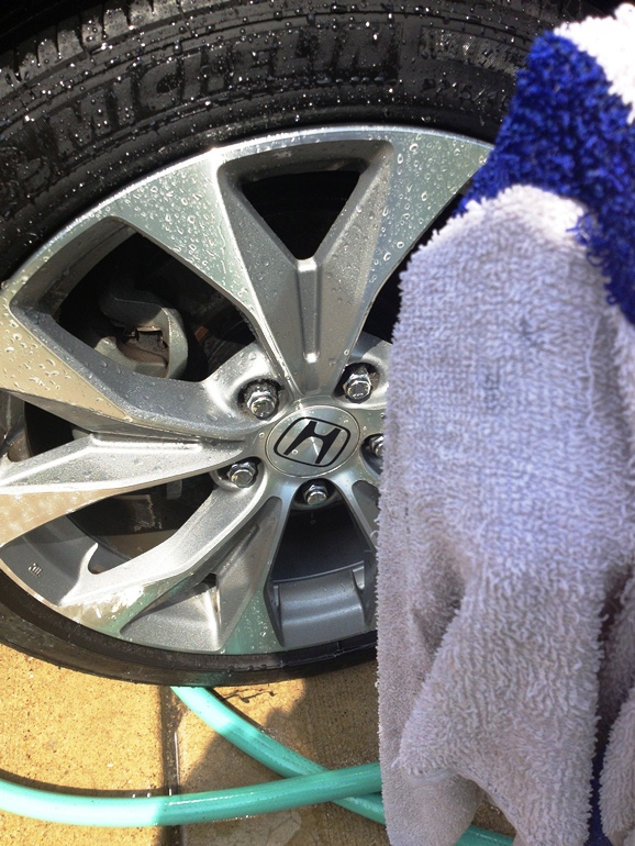 towel drying car tire
