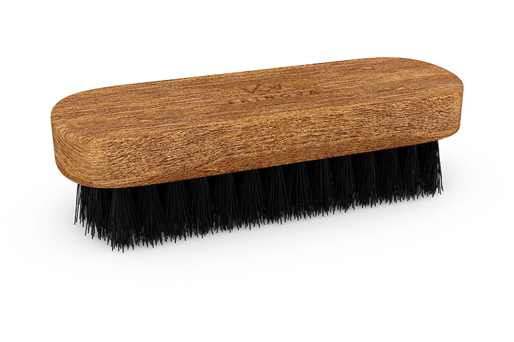 leather brush with bristles facing down