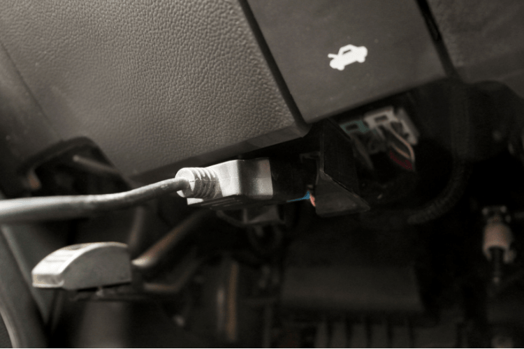 We plugged the scanner into the OBD-II port which is located under the dash on the driver side in just about every vehicle made since the late 1980s. Sometimes it is hidden behind a door. This is done with the key off, plug it in, then turn on the key (do not start).