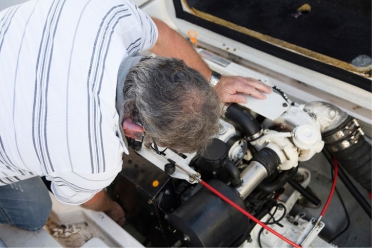 An engine gets a lot of debris in it from the water during yearly operation.