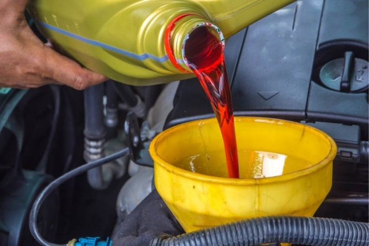New transmission fluid is a bright, translucent and vibrant red color.