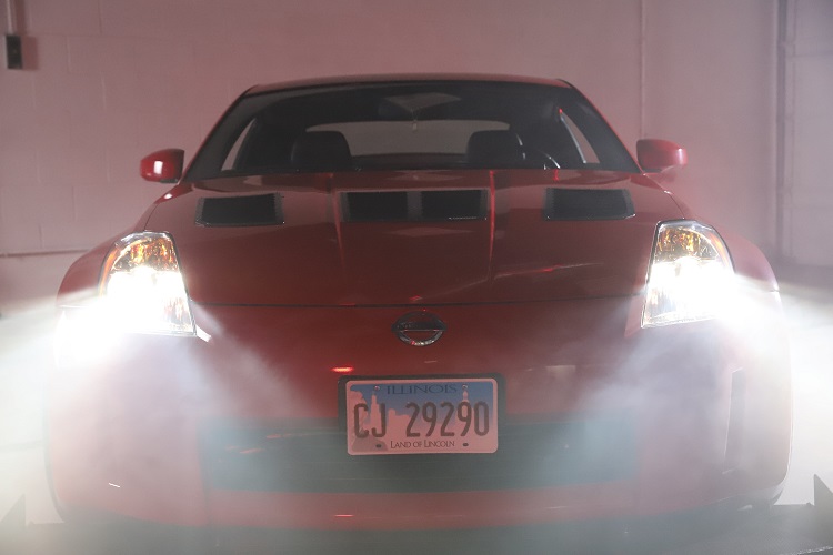 headlights on straight on smoke min