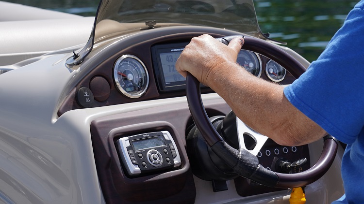 Hand On Boat Steering Wheel 2 min