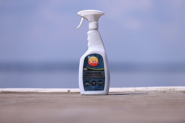 bottle of 303 Marine Graphene Nano Spray Coating with blue ocean in background
