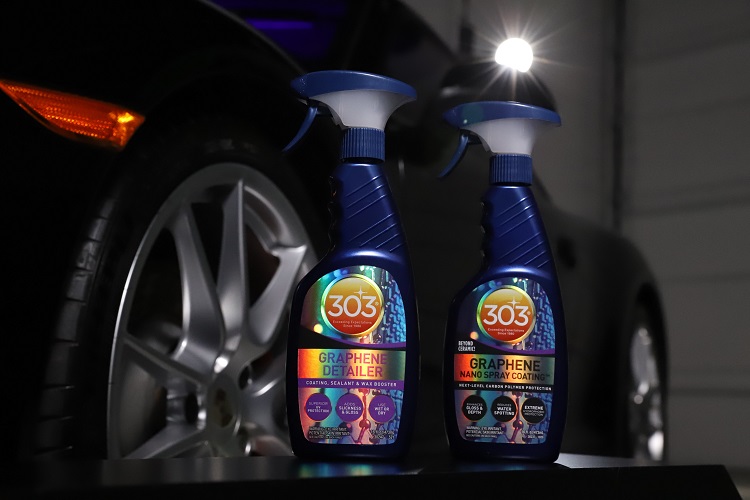 303 Graphene Detailer and 303 Graphene Nano Spray Coating sitting next to car