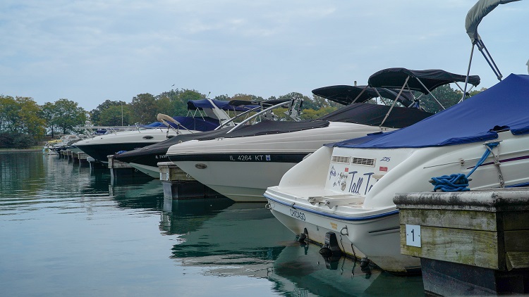 medium sized boats lined up in a row at Diversey Harbor in Chicago