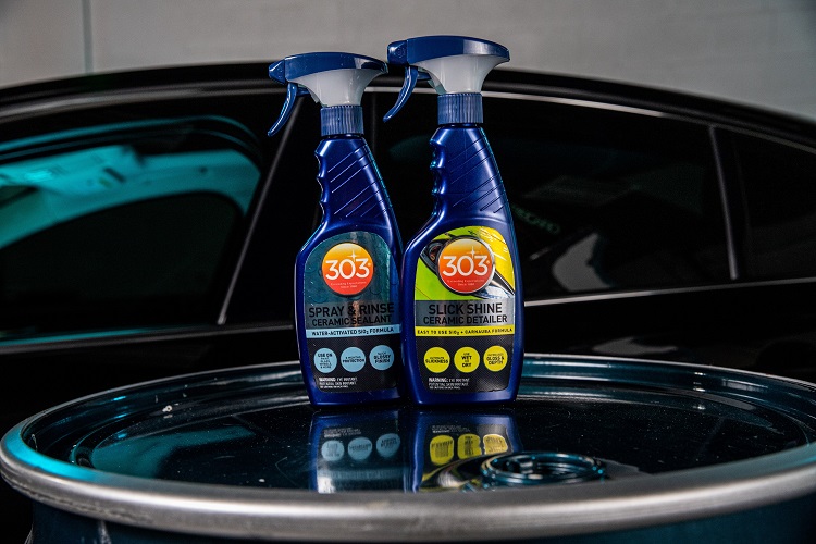 303 spray and rinse ceramic sealant and 303 slick shine ceramic detailer sitting atop of vehicle
