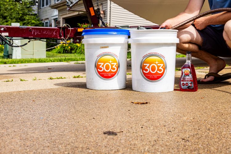 30586 In Use Washing Red White Glastron Driveway 6