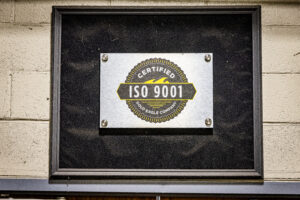 ISO-9001 Certification placard is displayed above our plant cafeteria as a reminder of our ongoing commitment to quality.