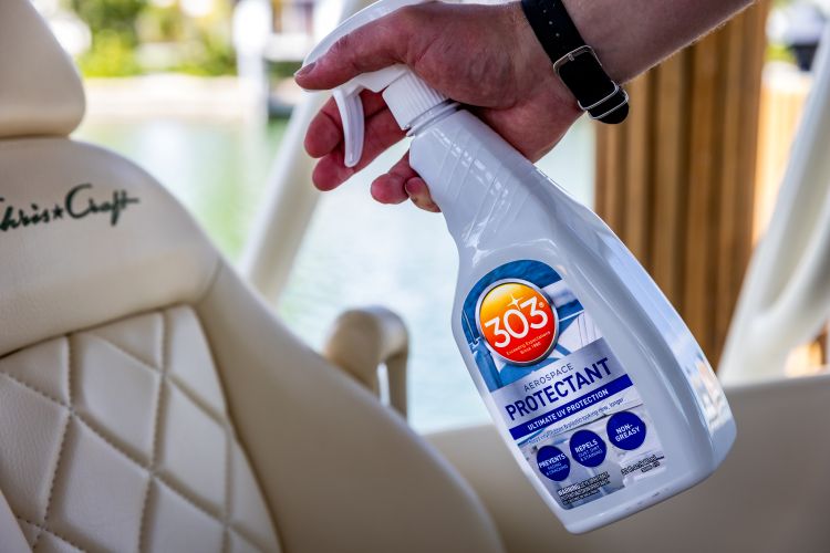 Protectant In Use Spraying Chris Craft Boat Seat 3