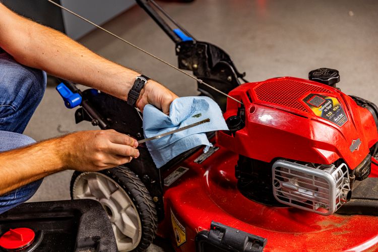 OPE Lifestyle Checking Mower Oil Level 3