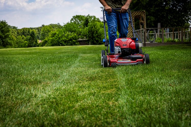 OPE Lifestyle Mowing Lawn Low Angle 23
