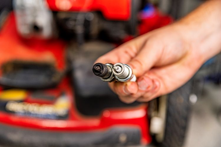 OPE Lifestyle Old vs New Mower Spark Plugs 1